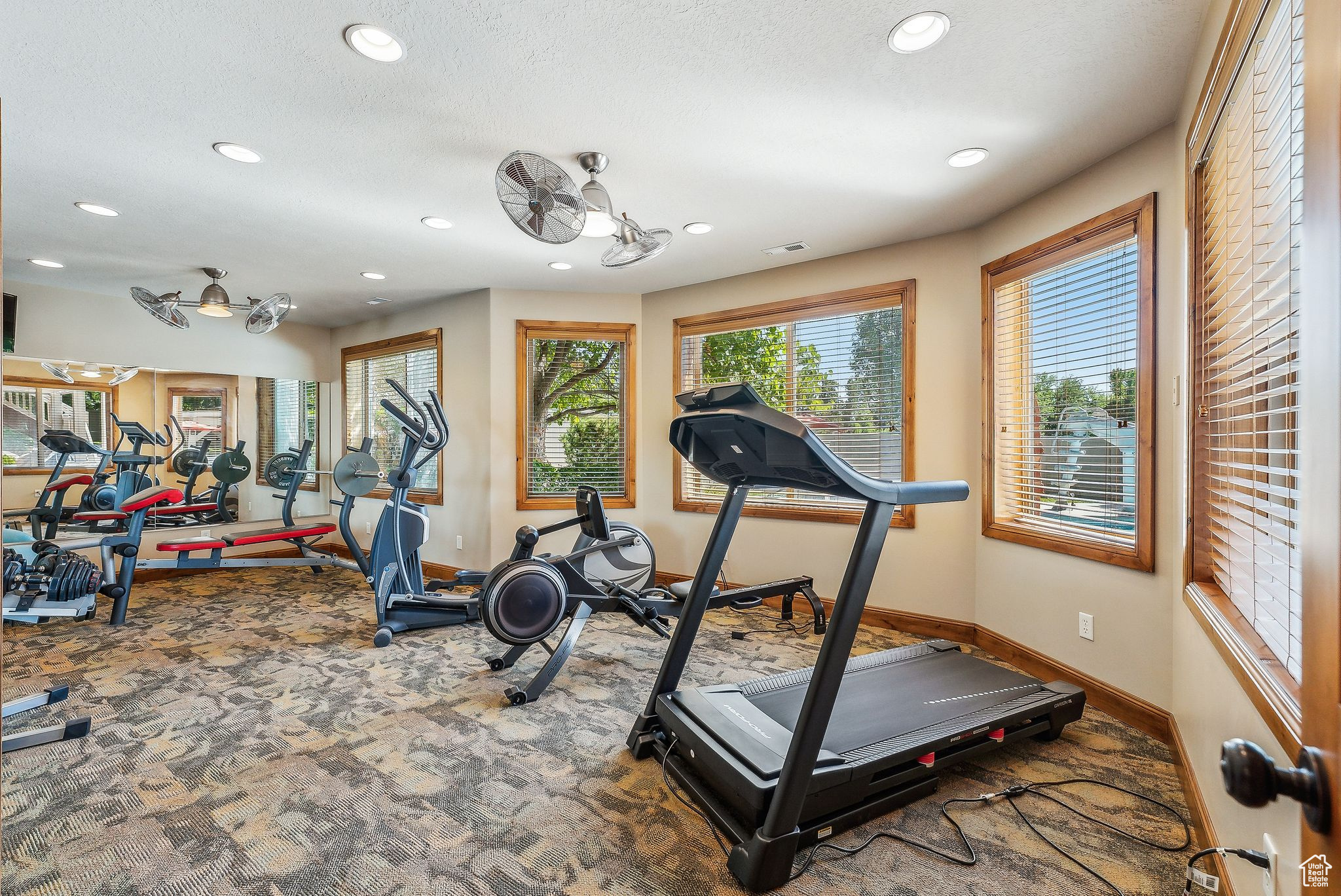 Workout room with carpet flooring