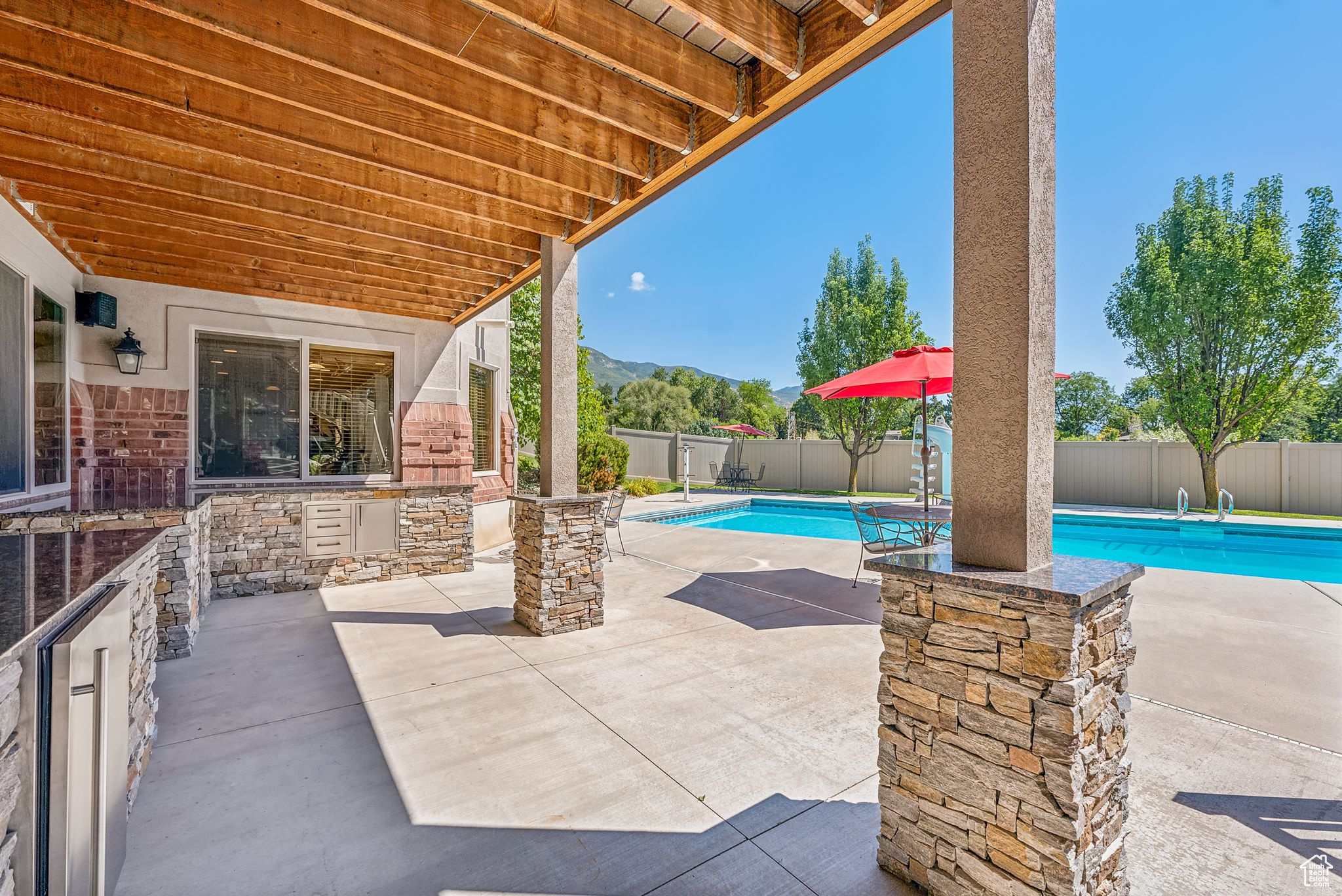 View of patio / terrace featuring a fenced in pool