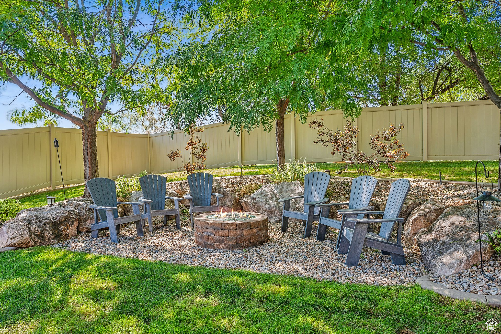 View of yard featuring a fire pit