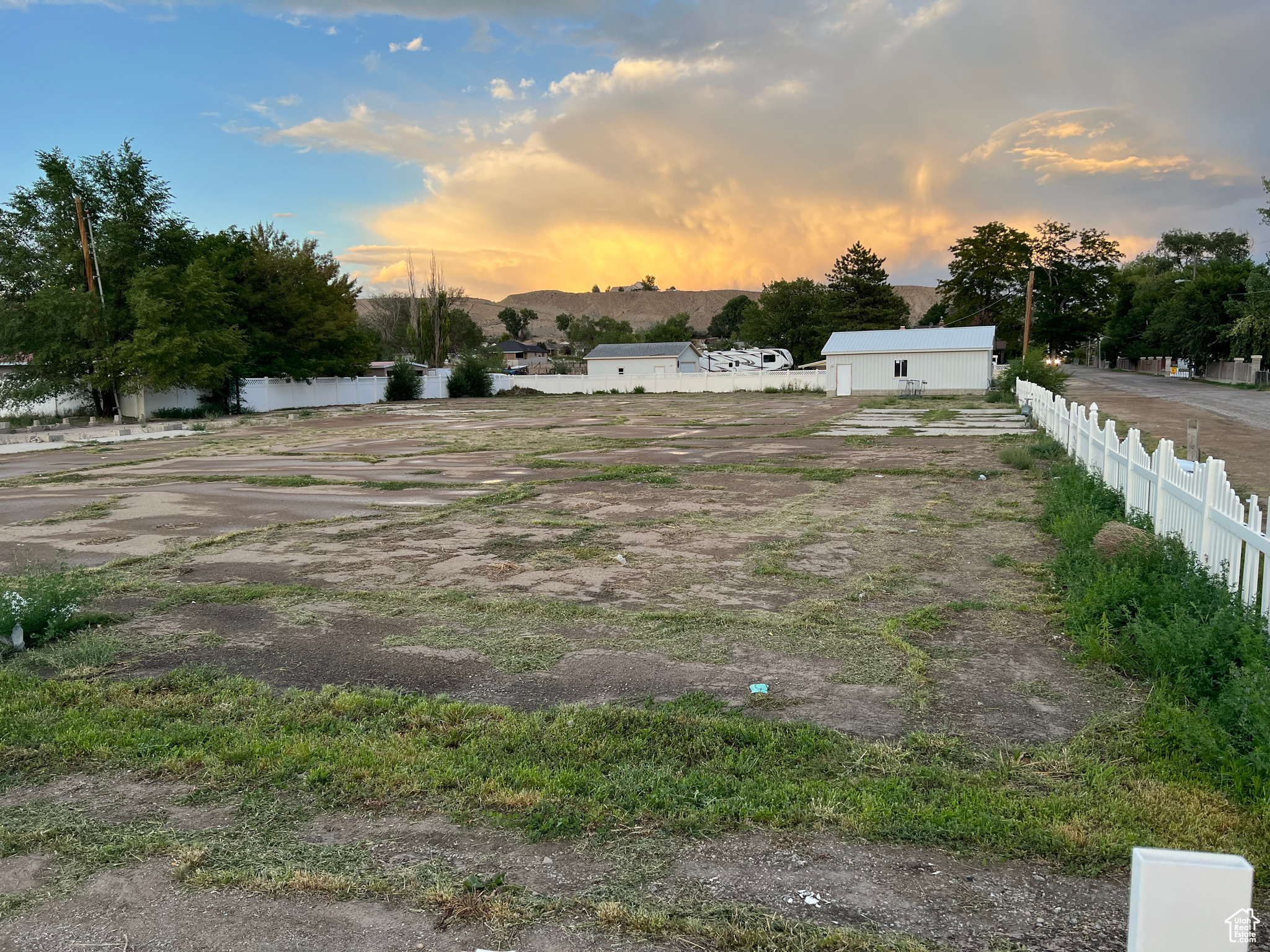 View of yard at dusk