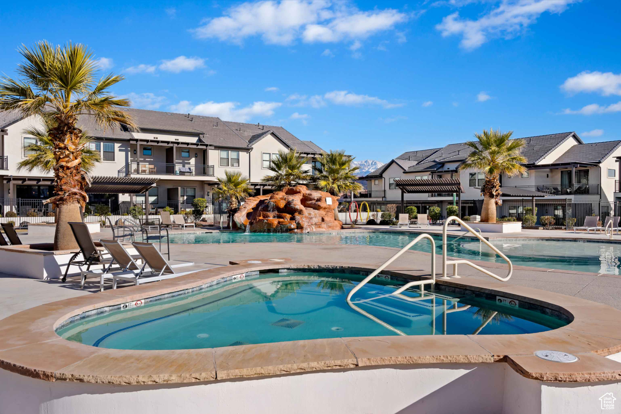 View of community pool and spa