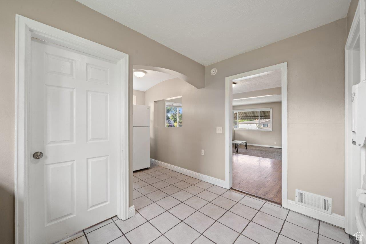 Spare room with light hardwood / wood-style flooring