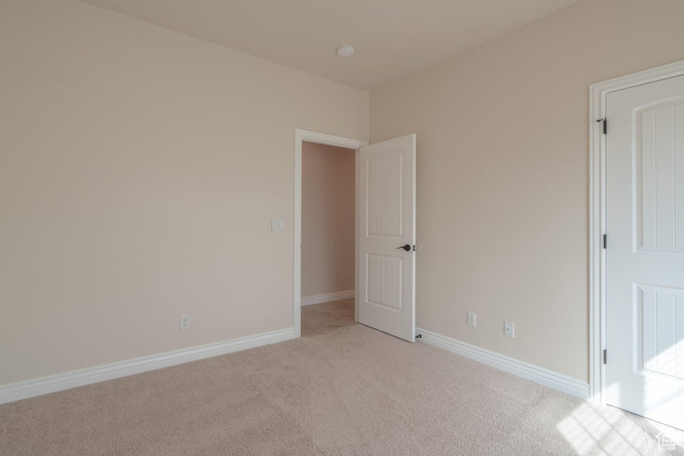 Interior space featuring light carpet