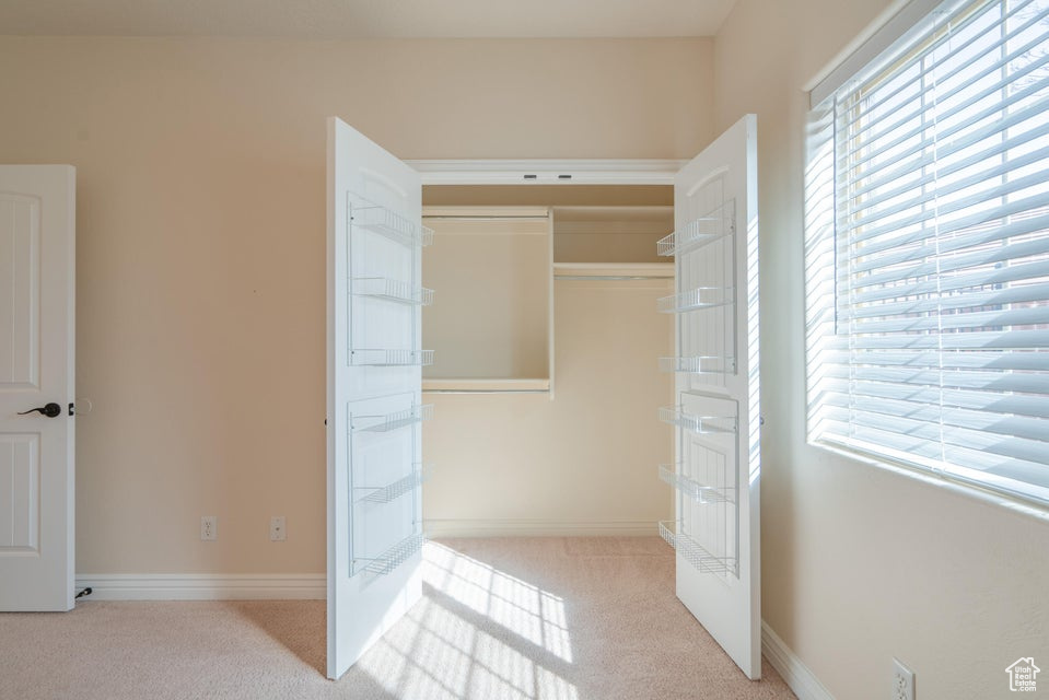 Interior space with light colored carpet