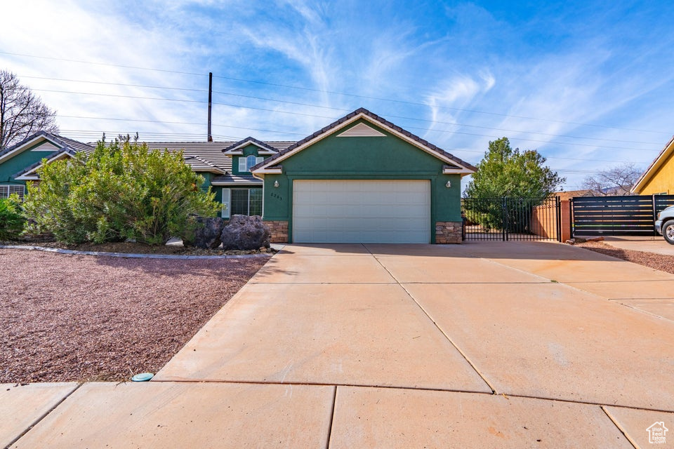 View of front of property with a garage