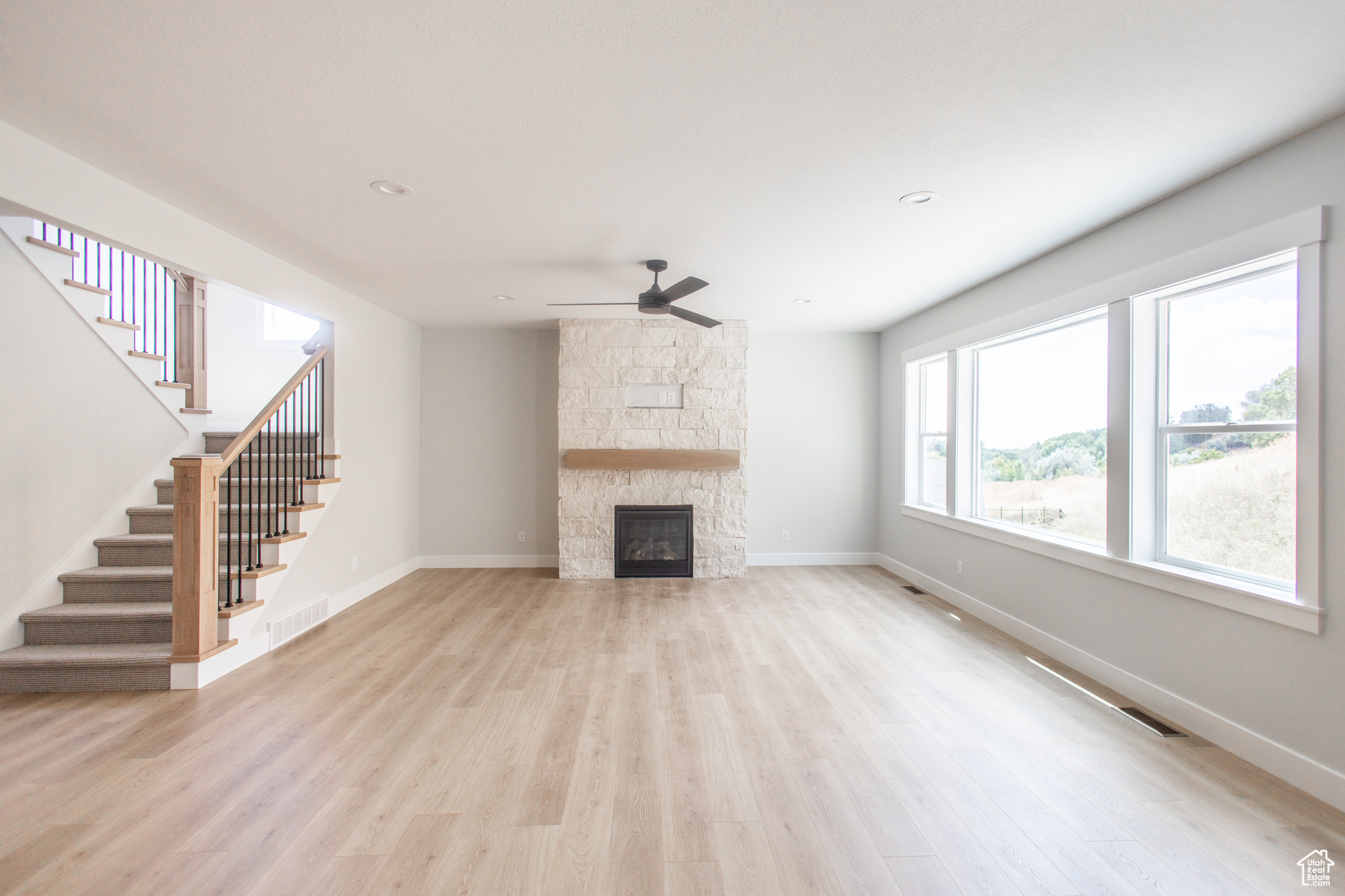 Huge Living Room with oversized windows to private backyard.