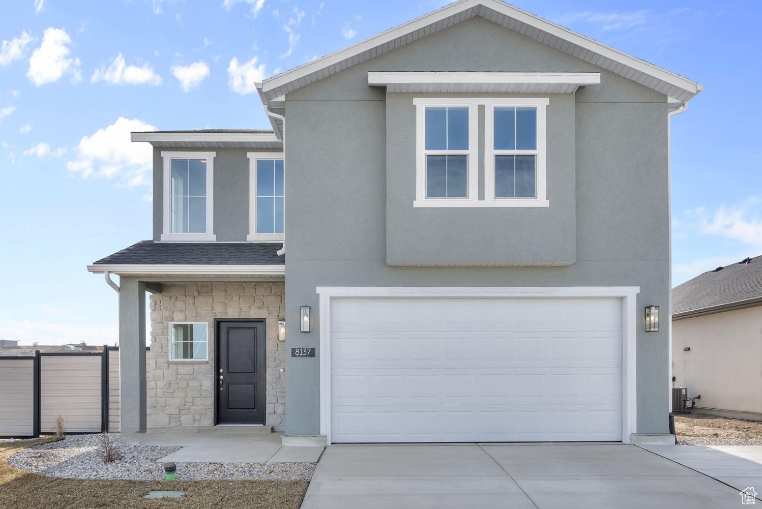 Front facade with a garage