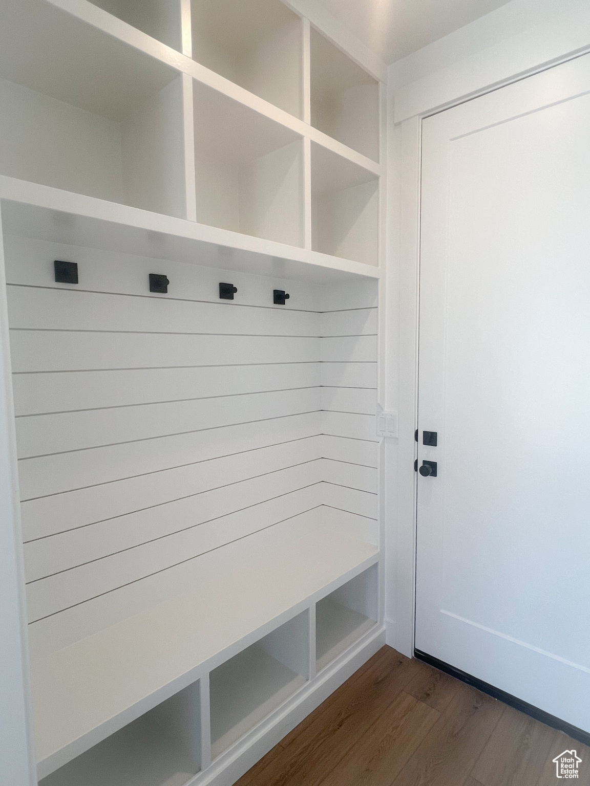 Mudroom featuring hardwood / wood-style flooring