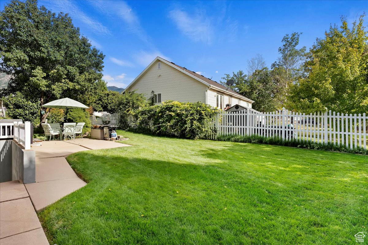 View of yard featuring a patio area