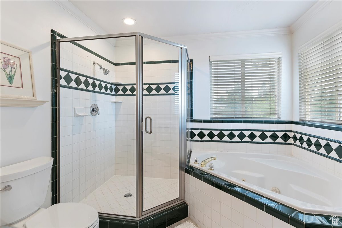 Beautiful master bathroom with double vanity, a jetted tub and a walk-in-shower