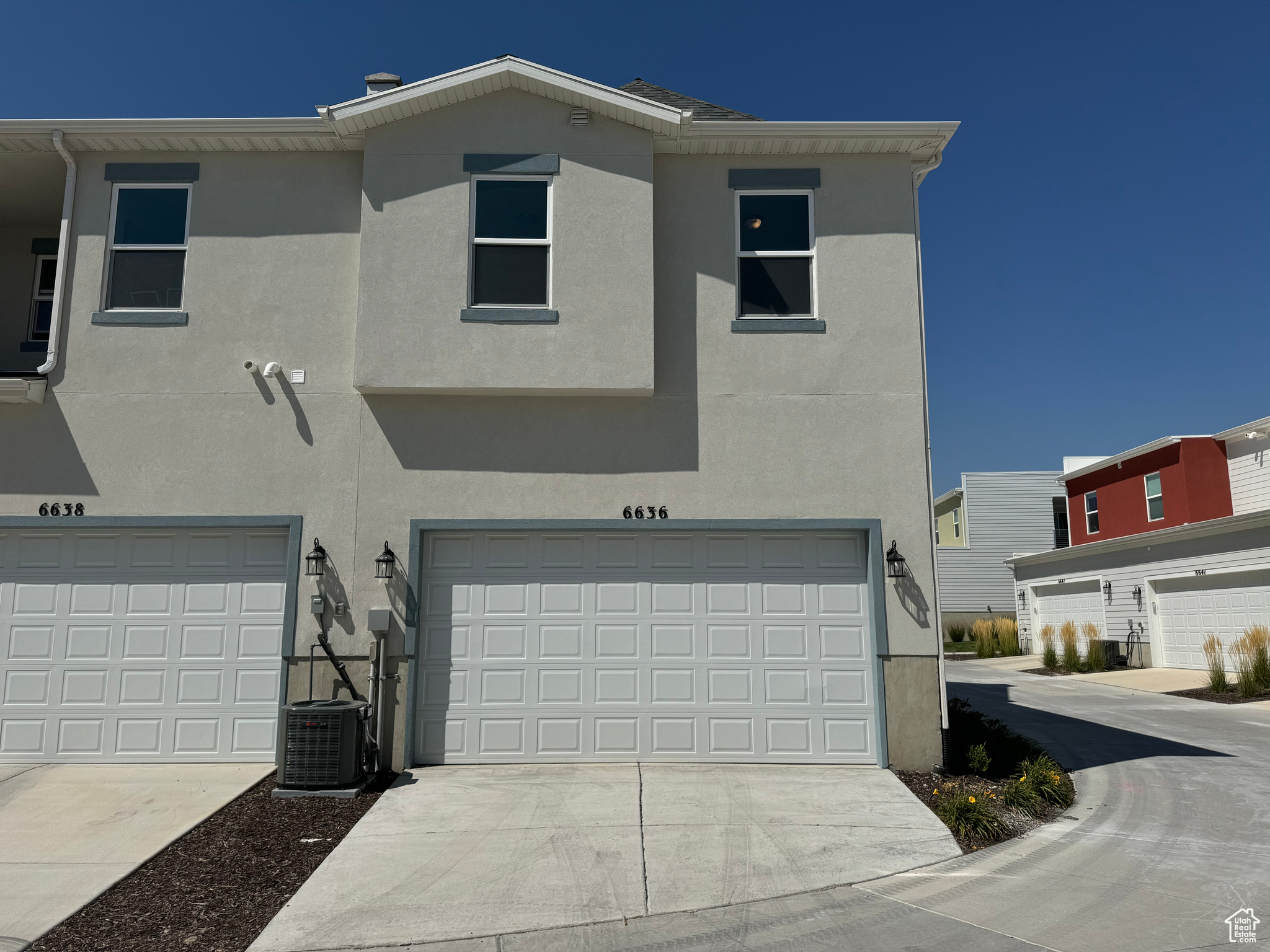 View of front of property featuring a garage