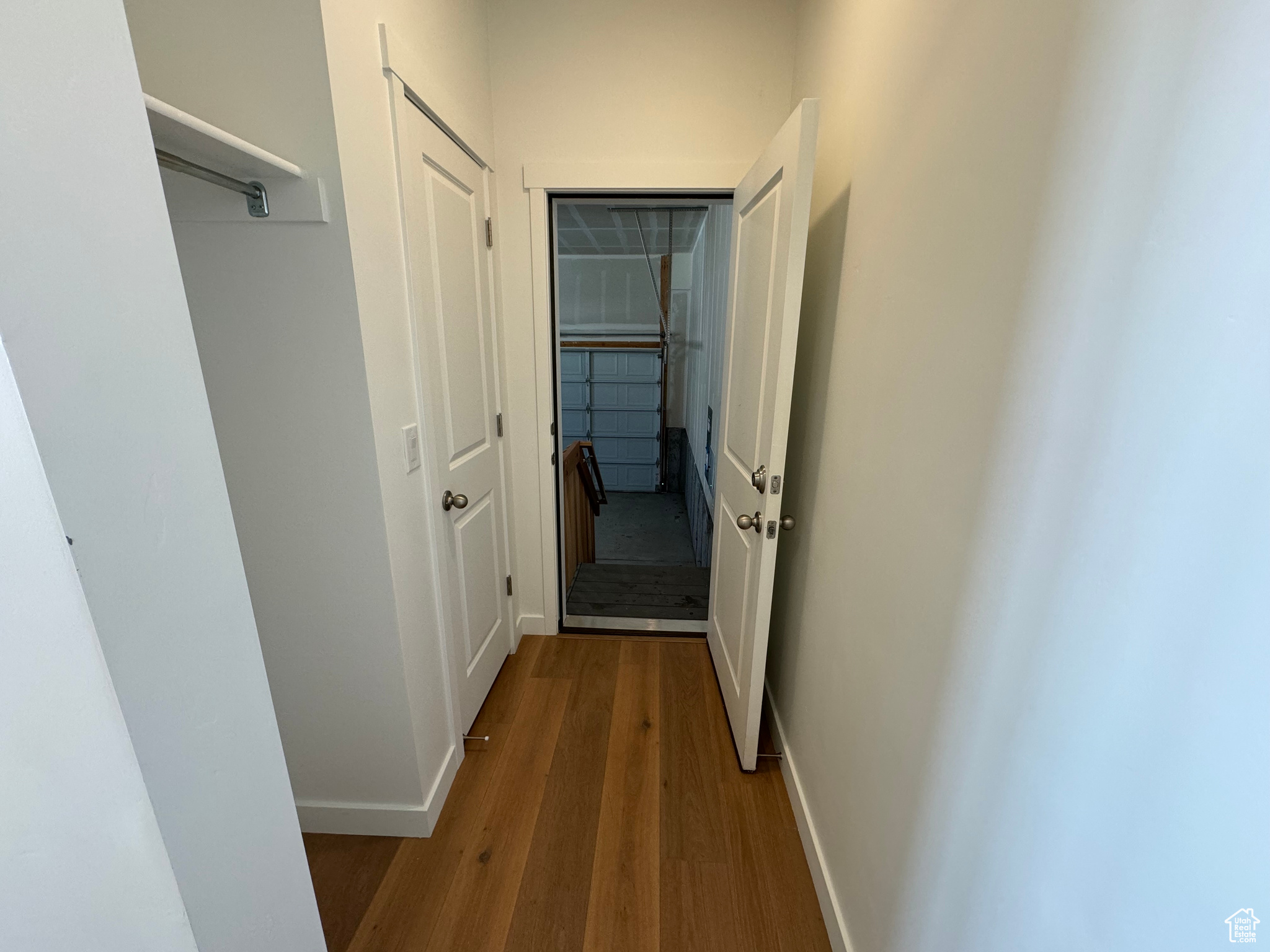 Hall featuring hardwood / wood-style floors