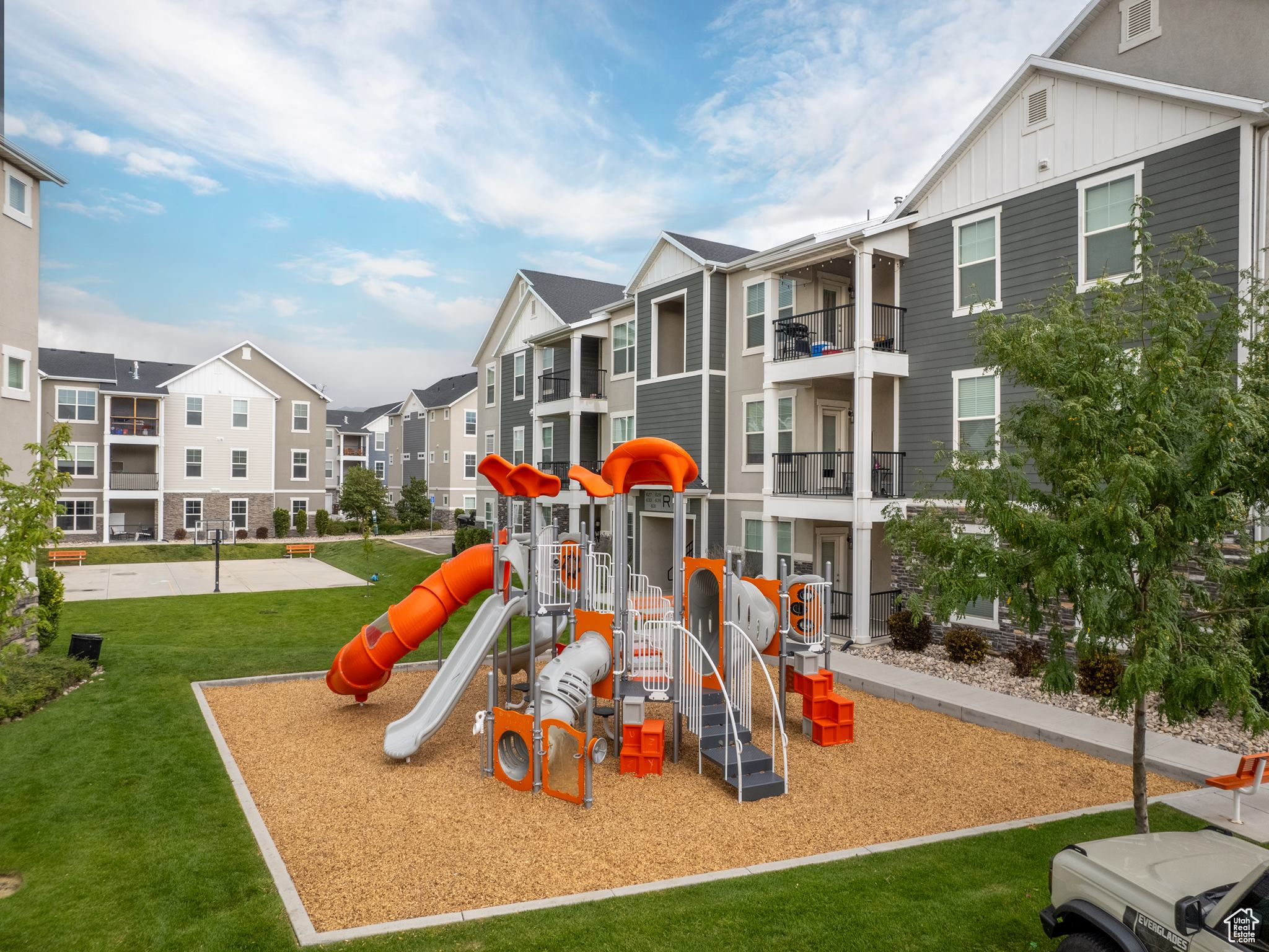 View of jungle gym with a yard