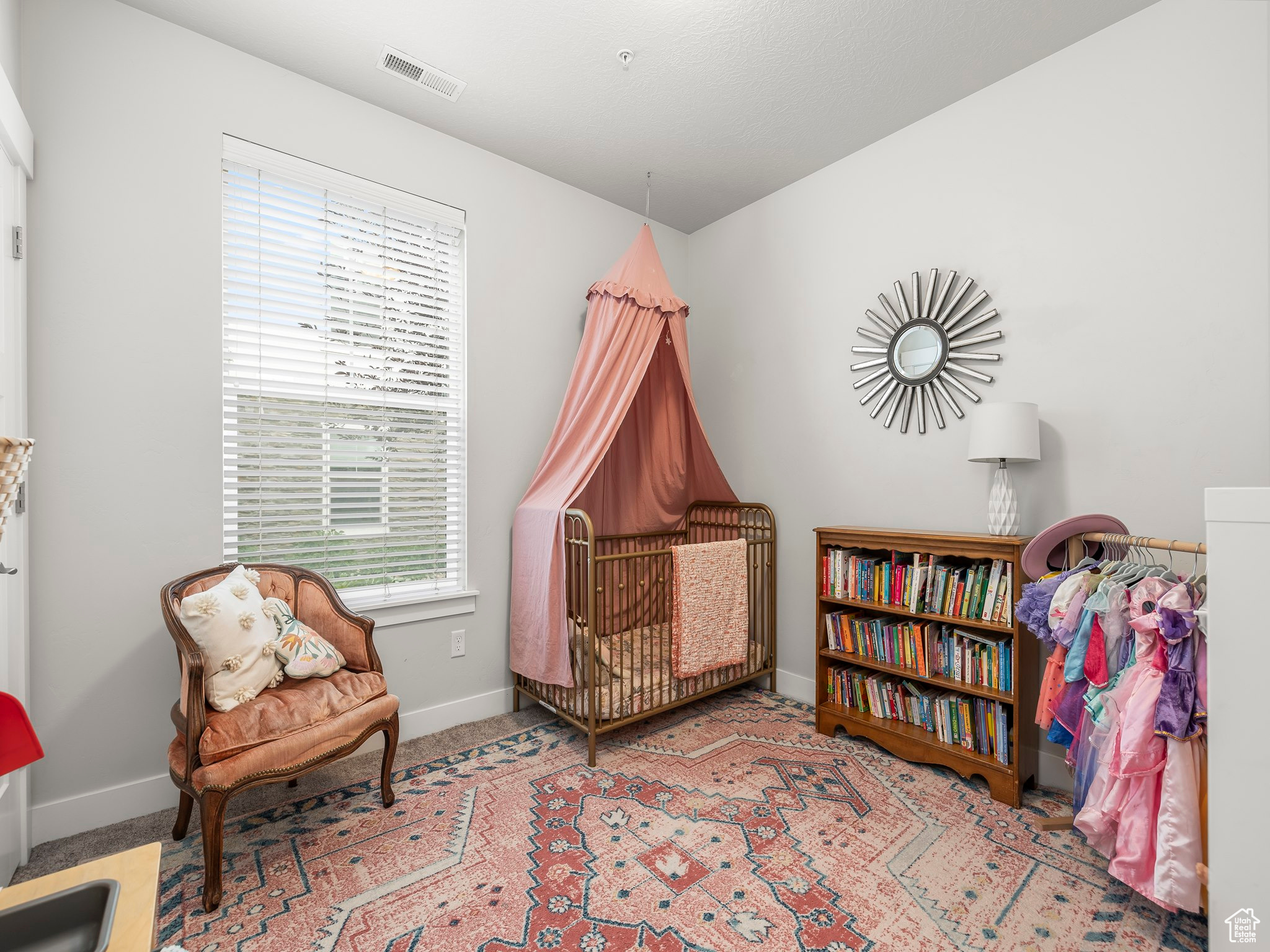 Living area with light carpet