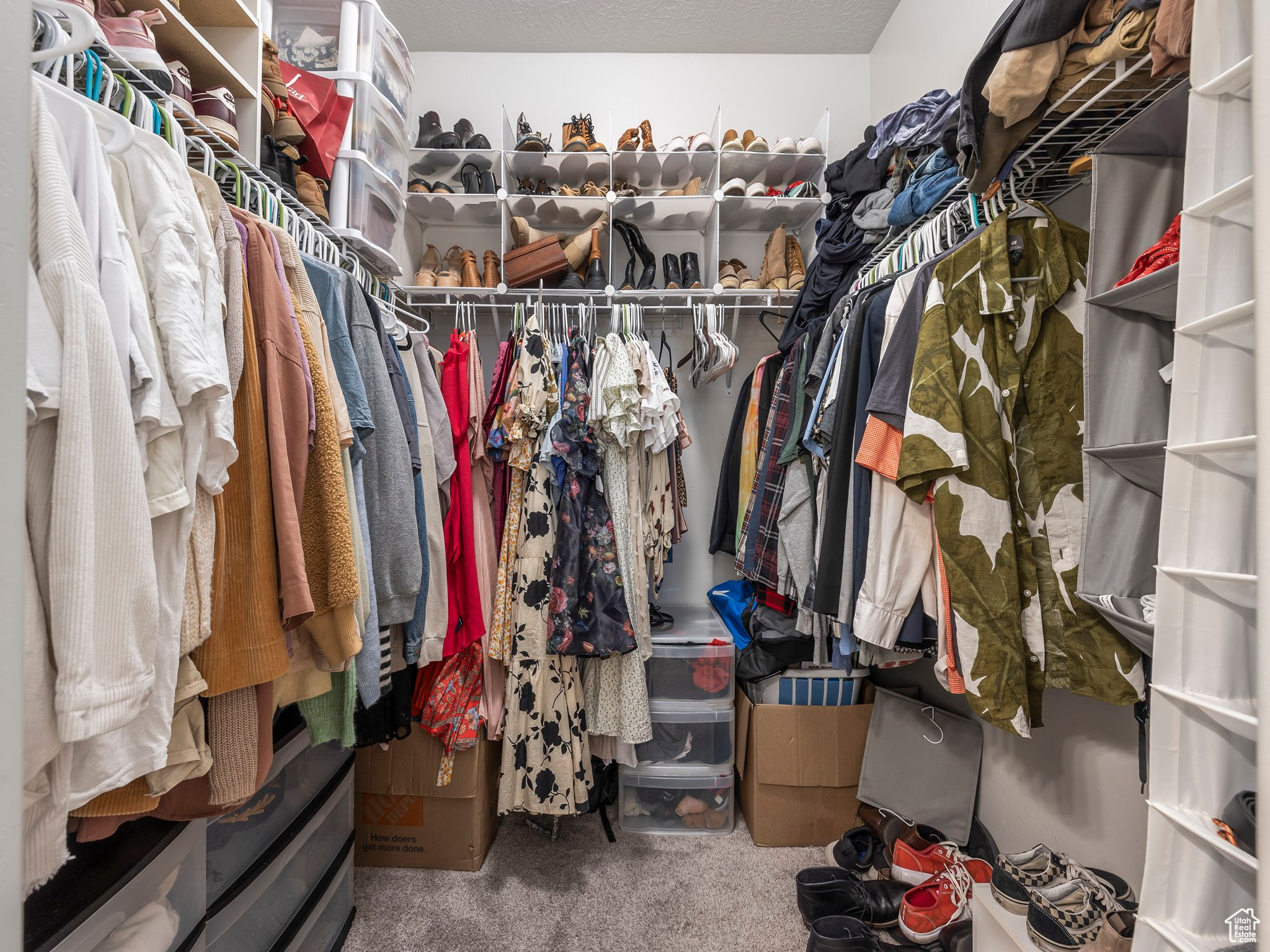 Spacious closet with carpet floors