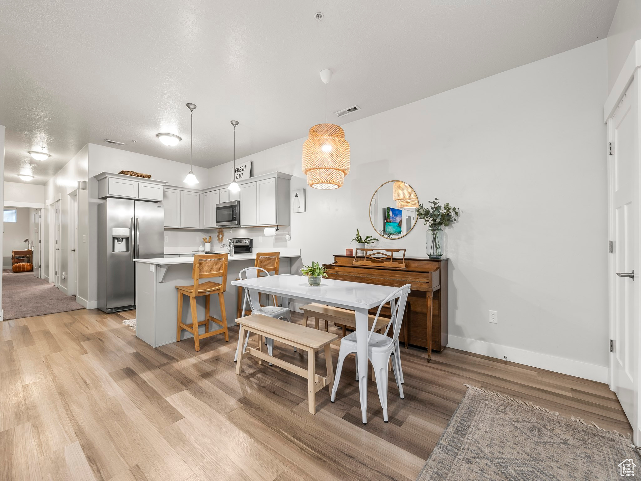 Dining area featuring light hardwood / wood-style floors