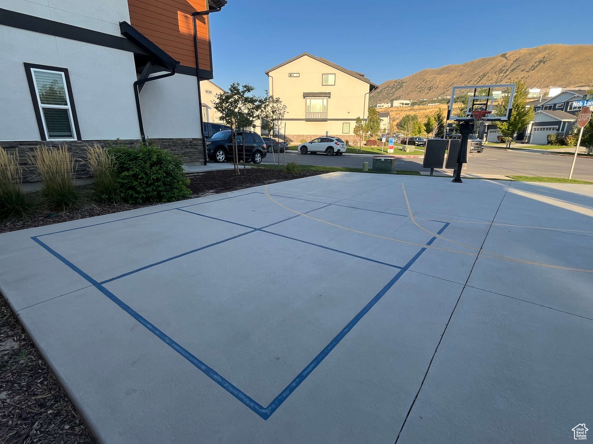 Four square court with a mountain view