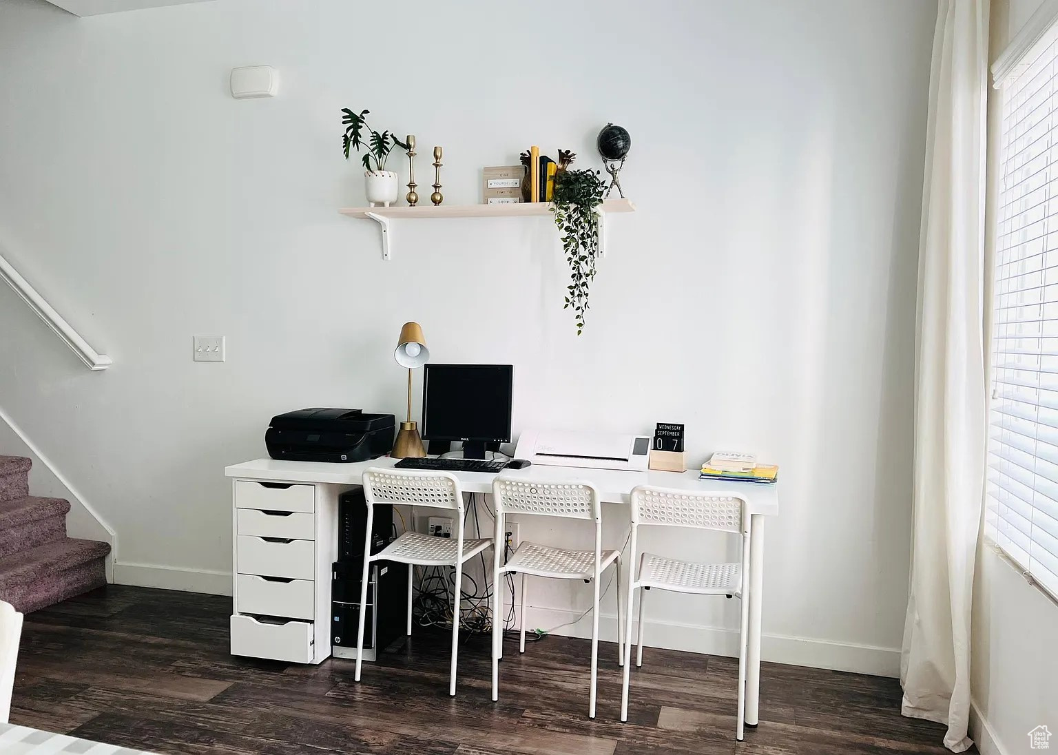 Office with dark vinyl floors