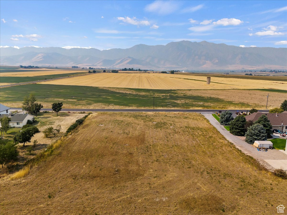 Property view of mountains featuring a rural view