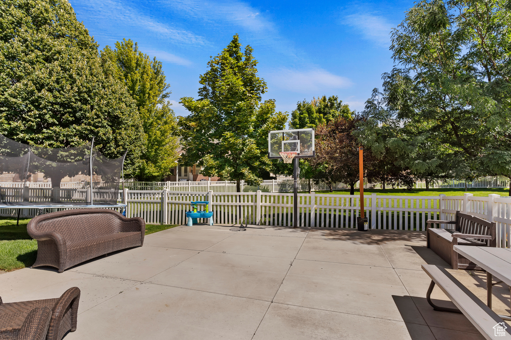 View of patio featuring basketball court