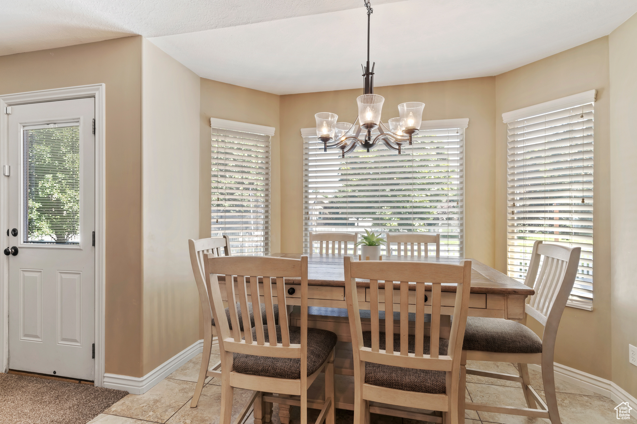 Dining area featuring a chandelier