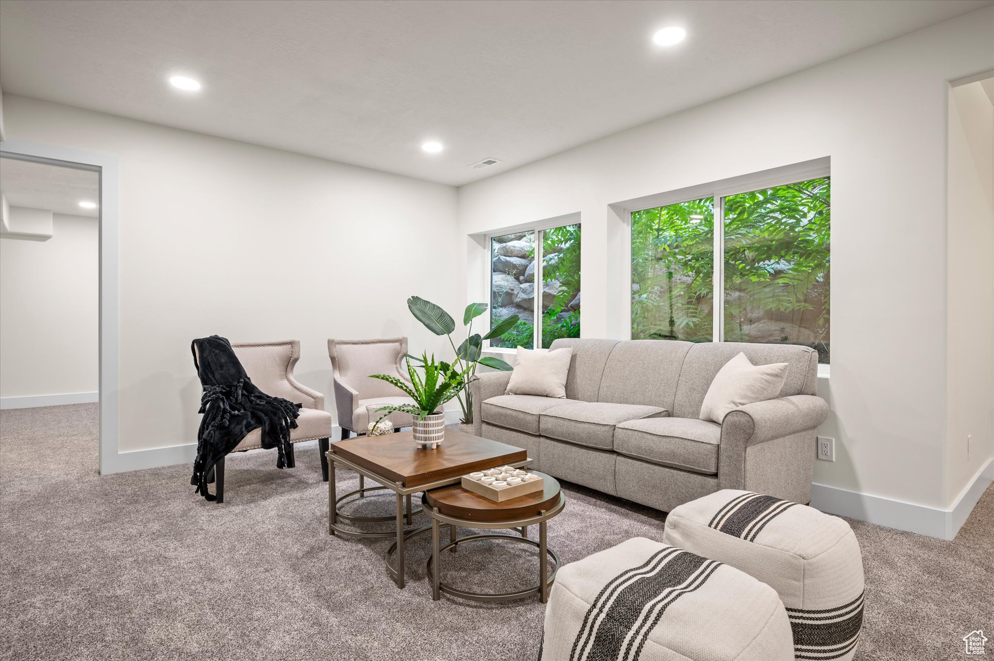 Living room with light carpet