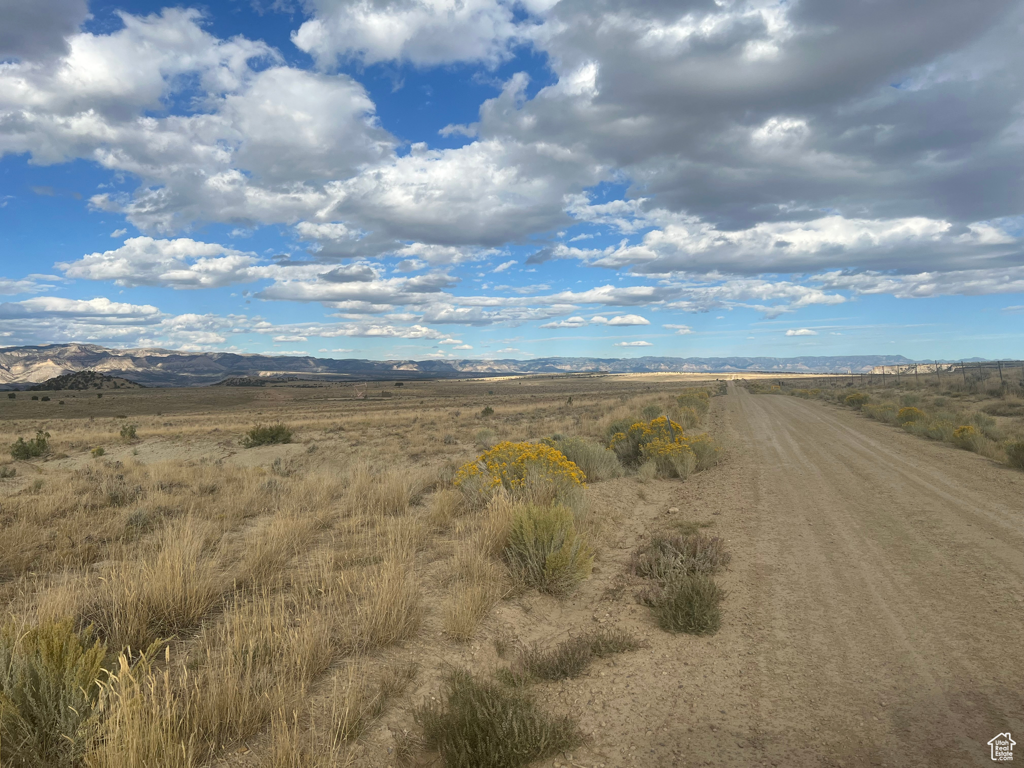 View of road featuring a mountain view and a rural view