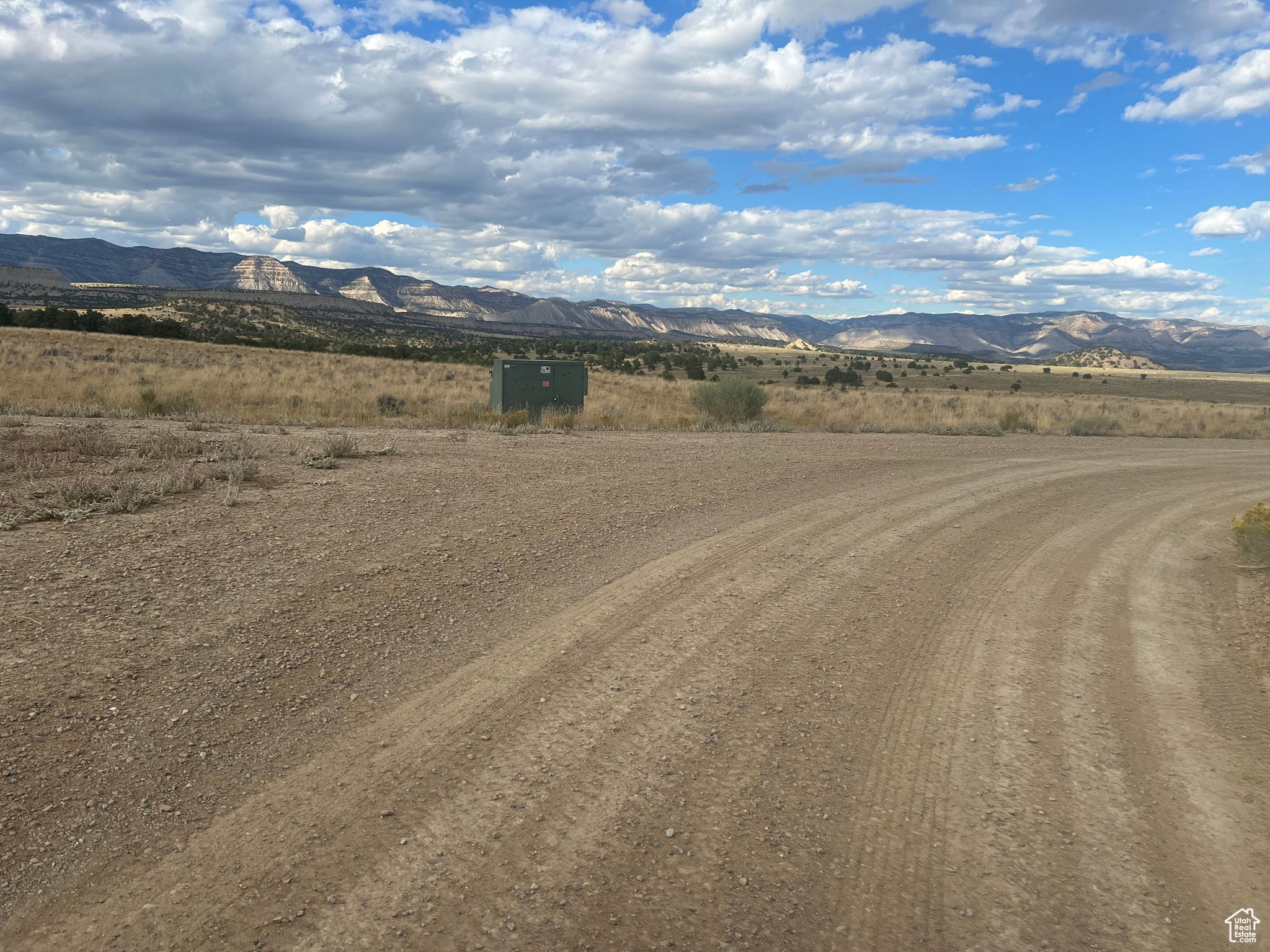 View of street featuring a rural view and a mountain view