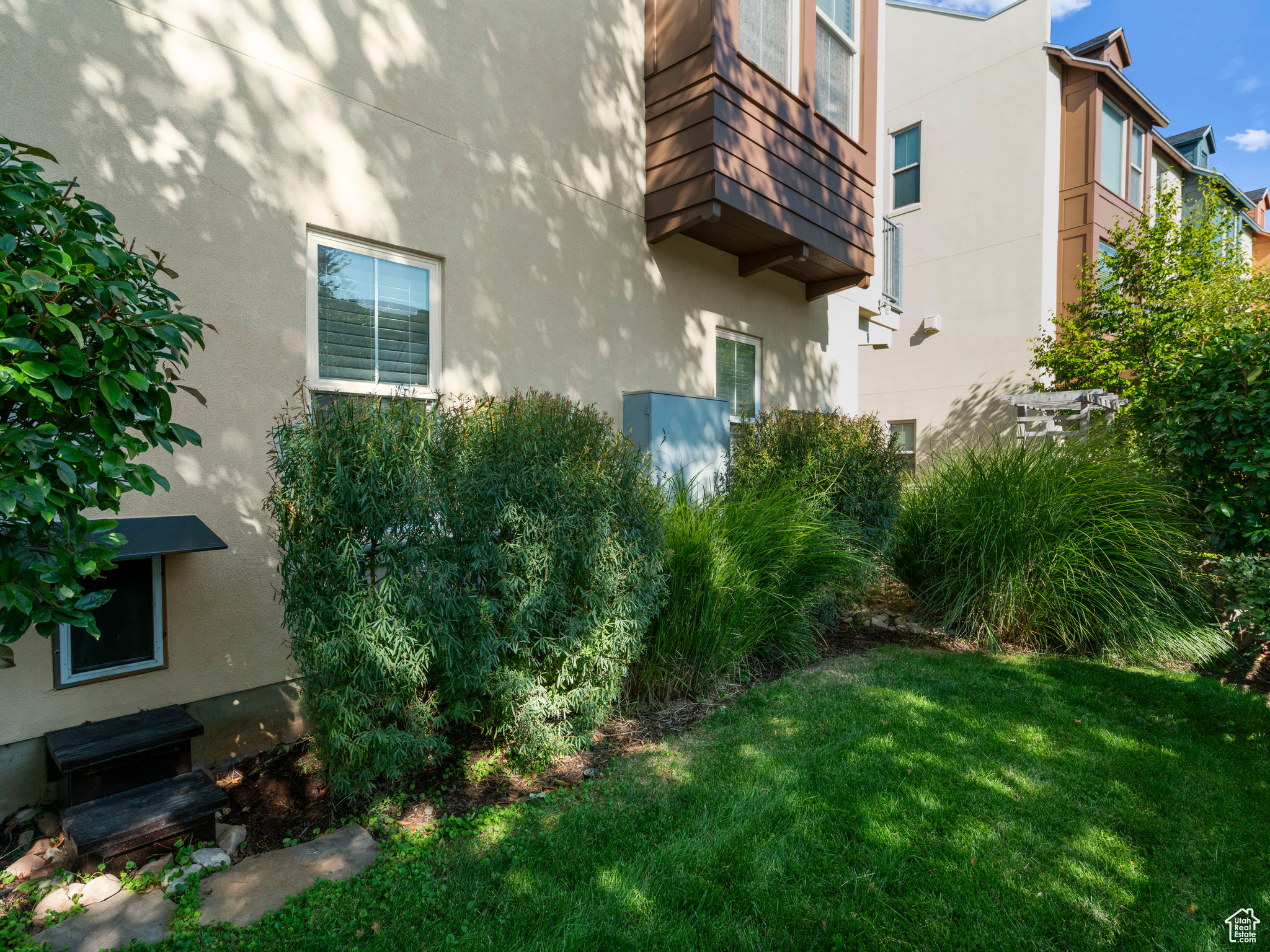 View of  side yard gate between front and side yard for dogs