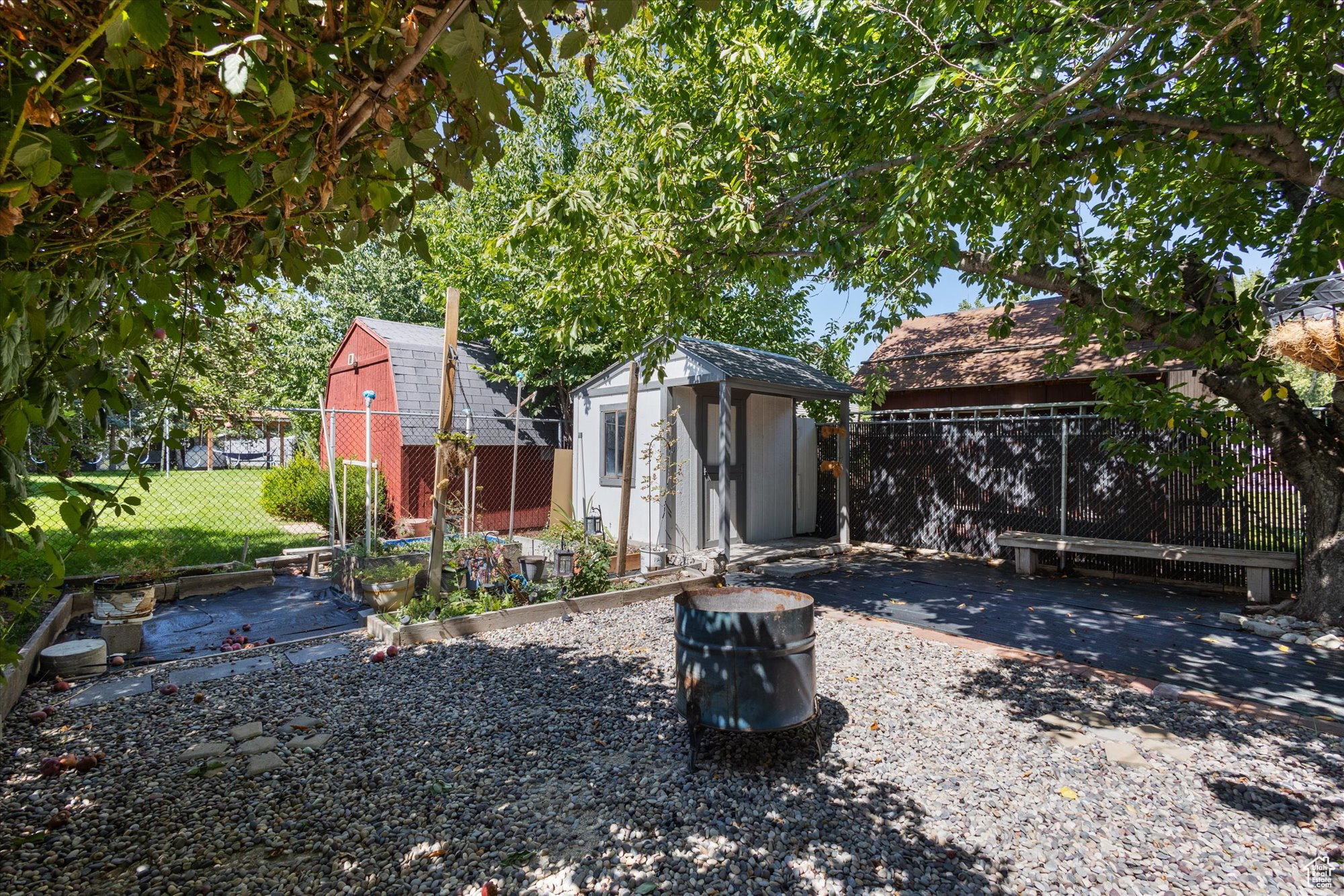 View of yard featuring a storage unit