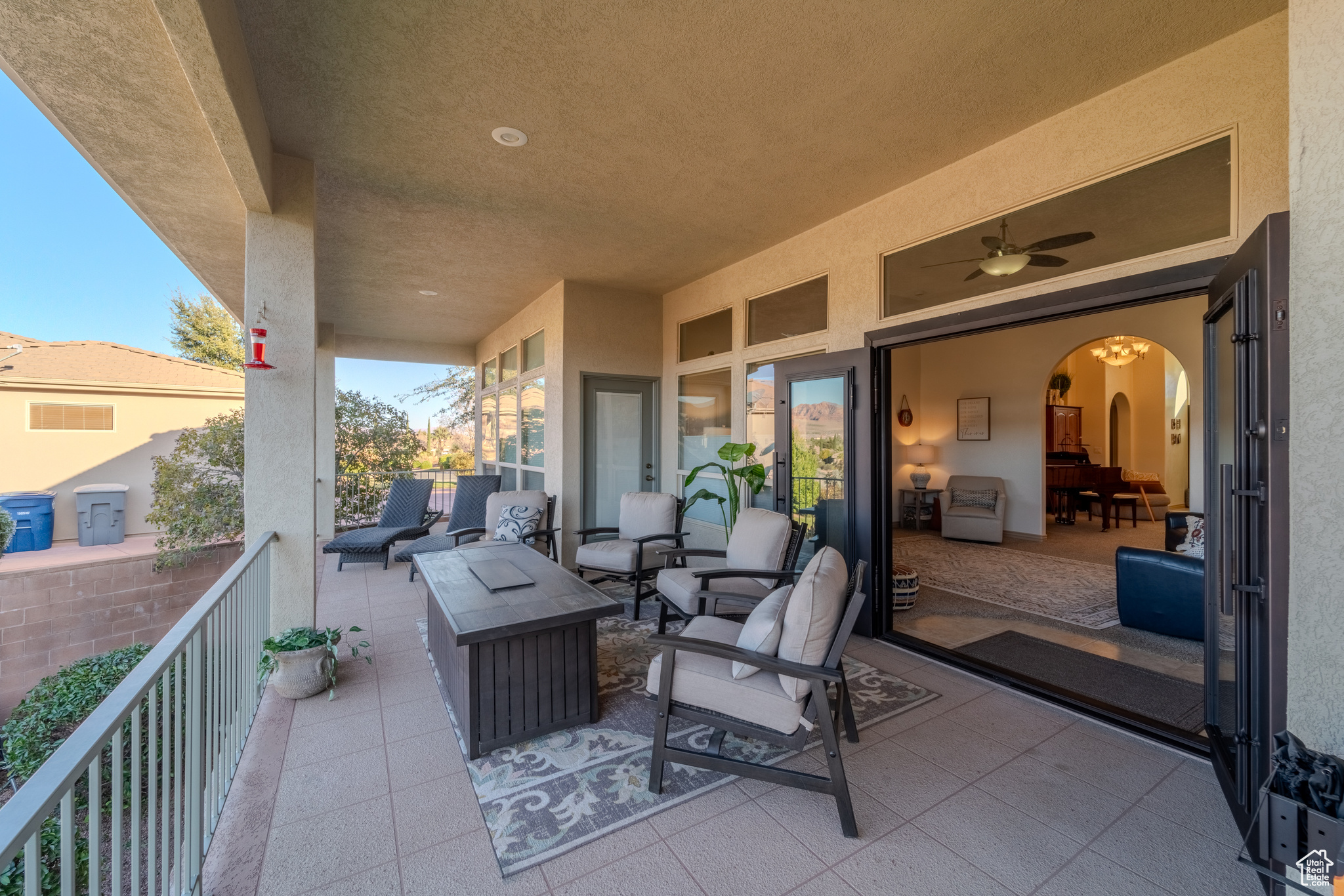 View of patio / terrace featuring an outdoor living space with a fire pit and ceiling fan