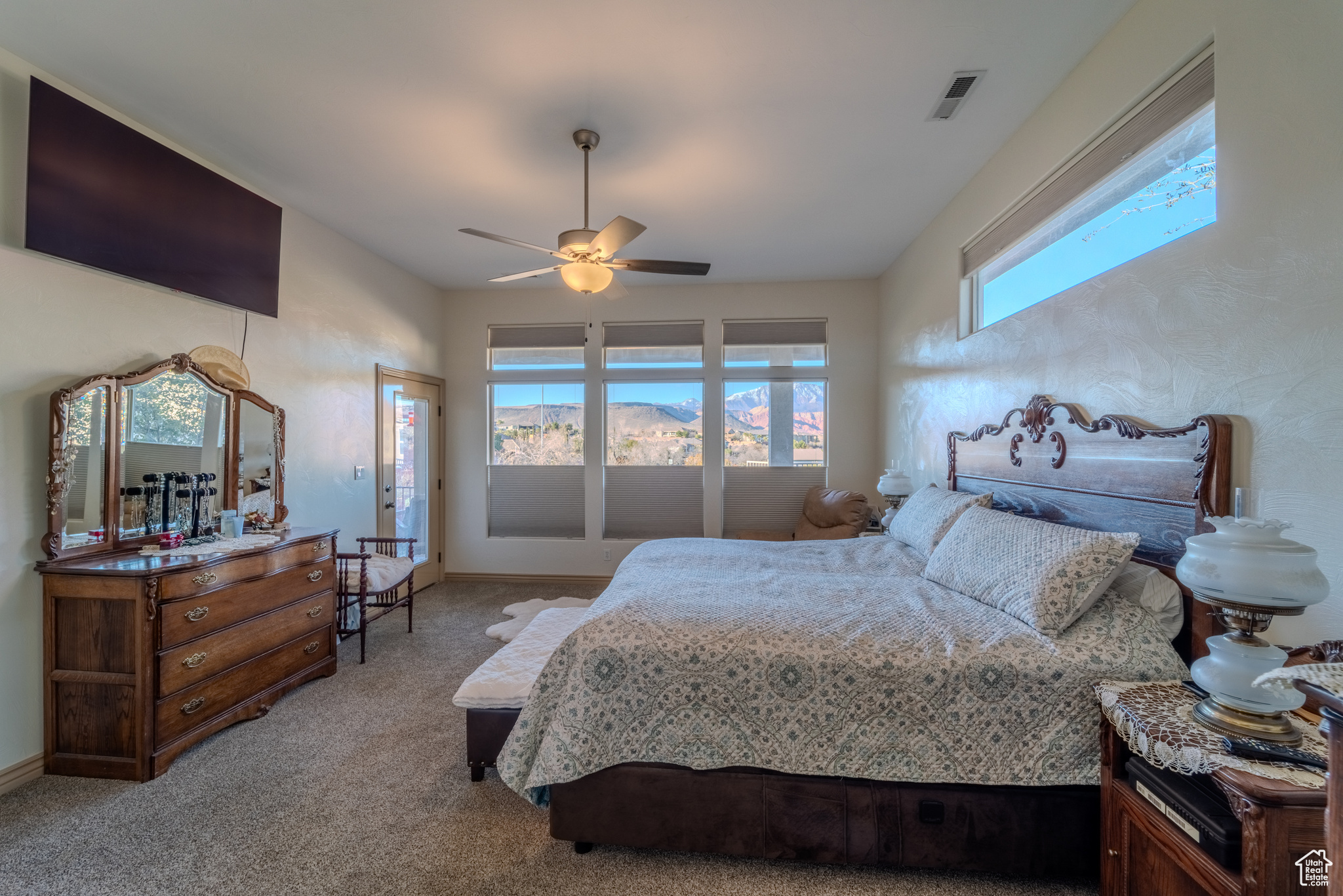 Bedroom with carpet flooring and ceiling fan