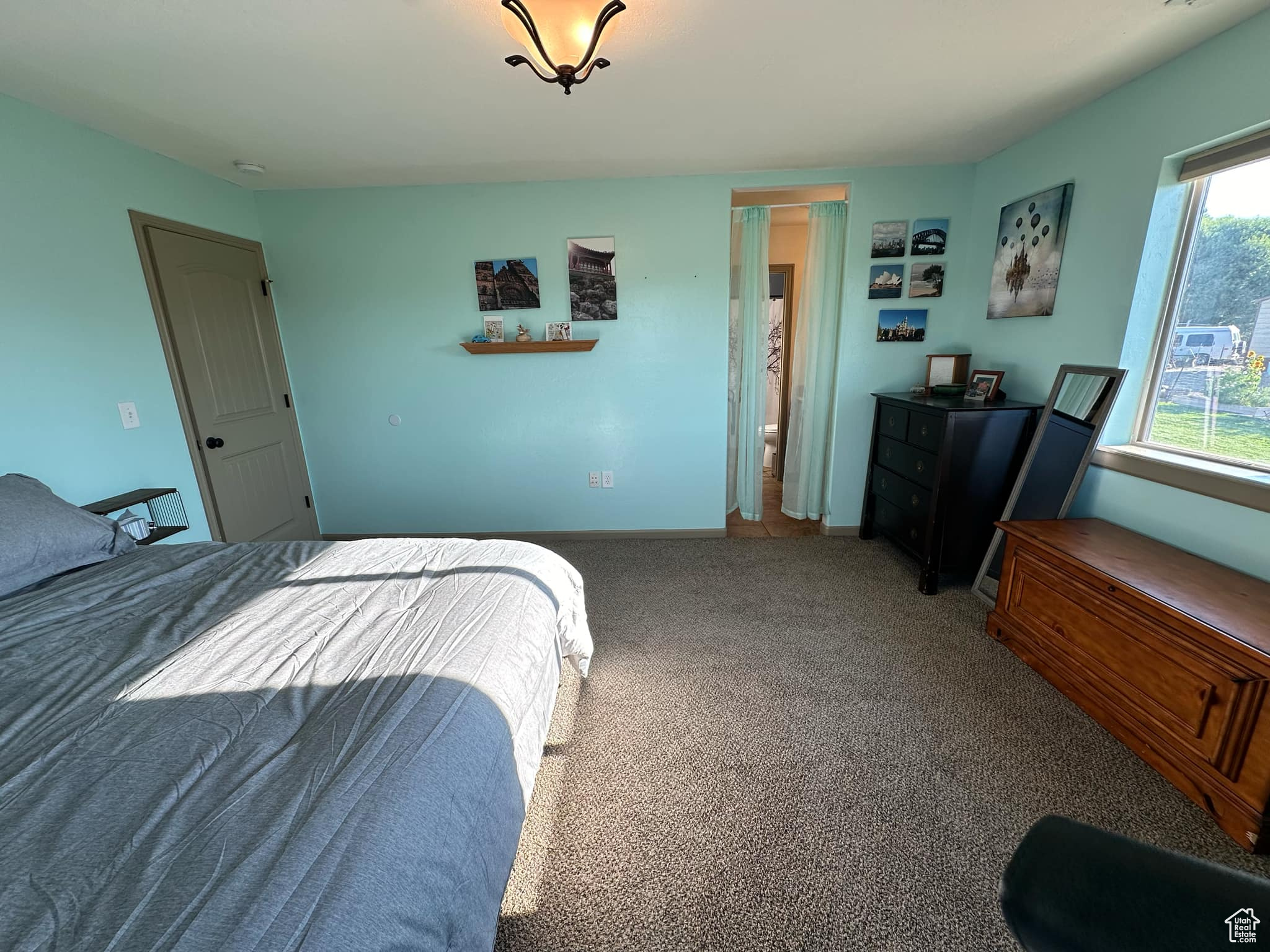 View of carpeted bedroom