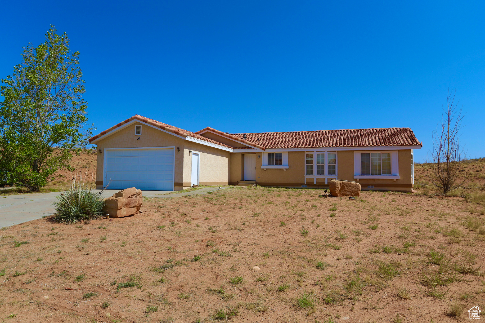 Ranch-style house with a garage