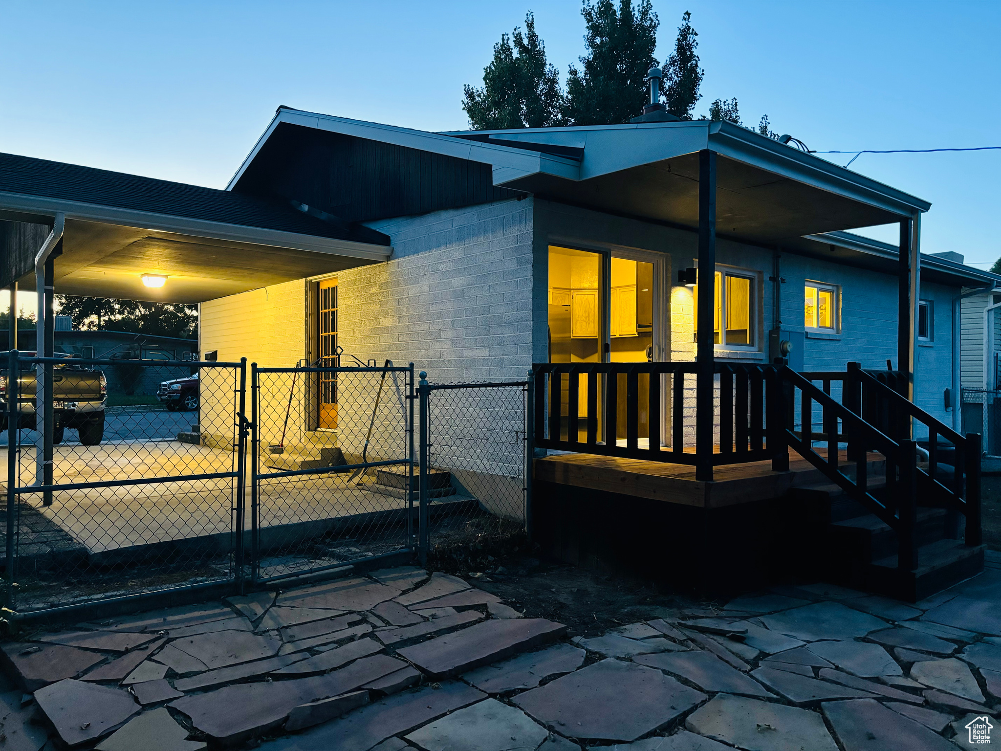 Rear view of property with a deck