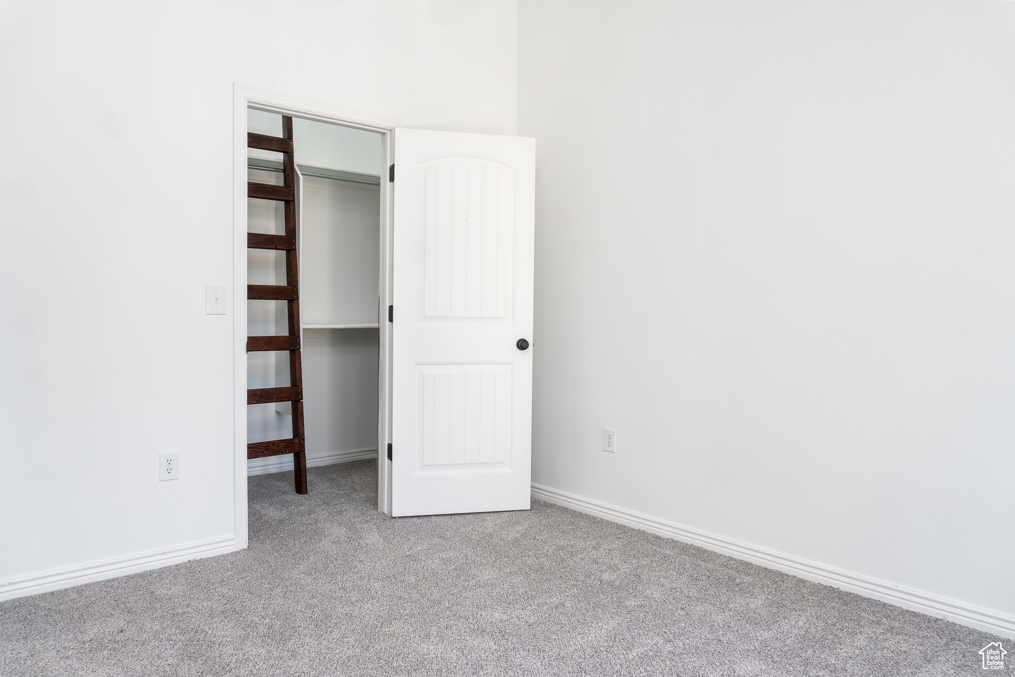 Master Bedroom-Unfurnished bedroom featuring light carpet