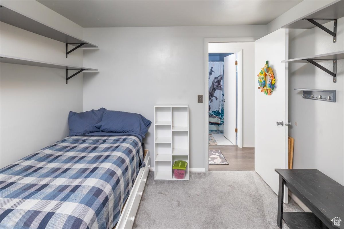 Bedroom featuring carpet floors