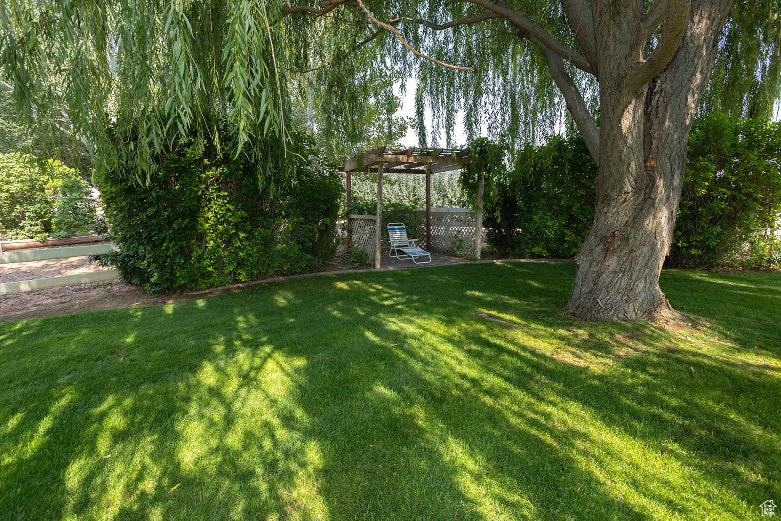 View of yard with a pergola