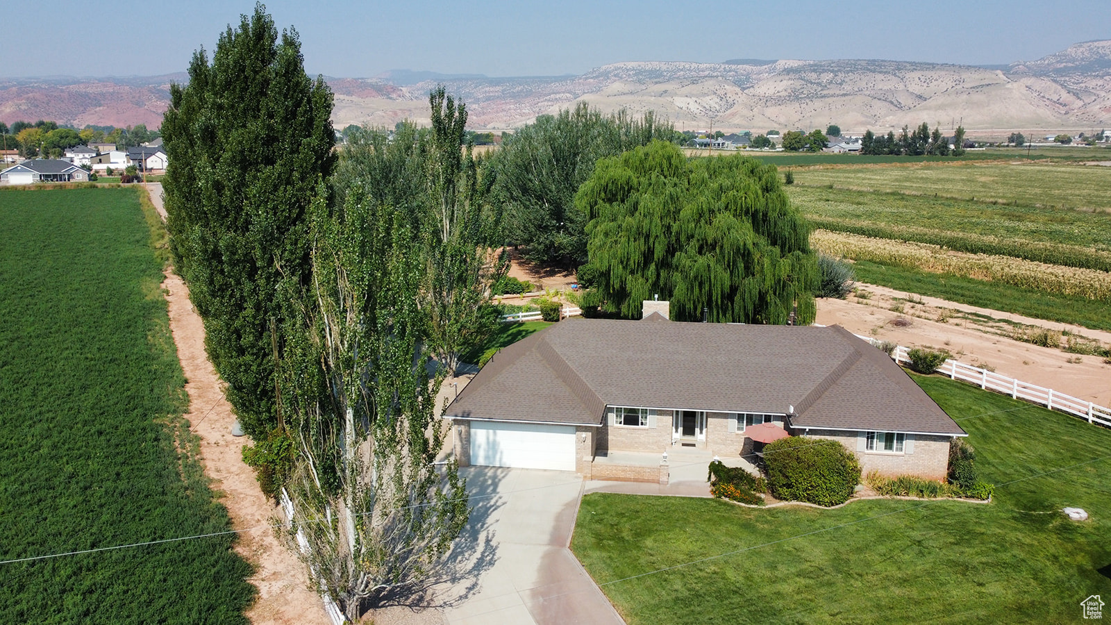 Birds eye view of property featuring a mountain view and a rural view