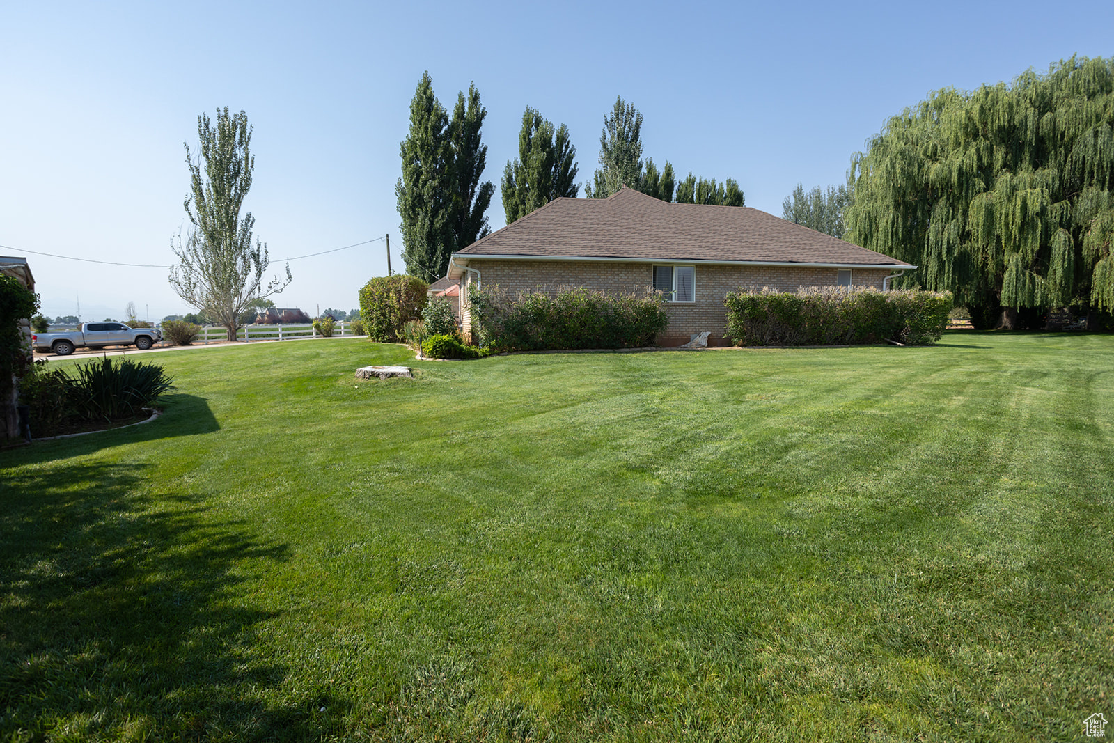 View of home's exterior featuring a yard