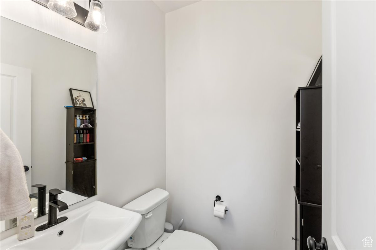 Bathroom featuring toilet and sink