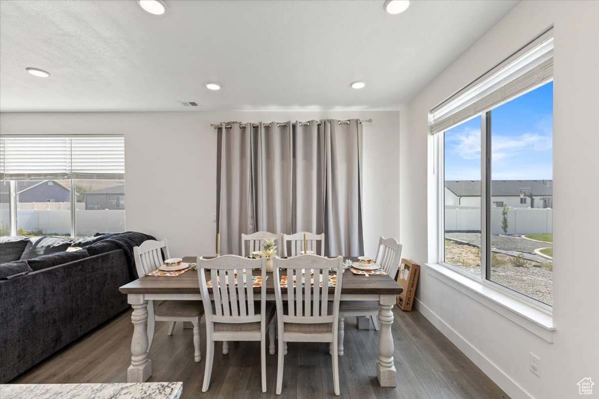 Dining space featuring wood-type flooring