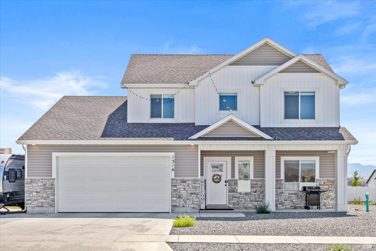 Craftsman inspired home with a garage