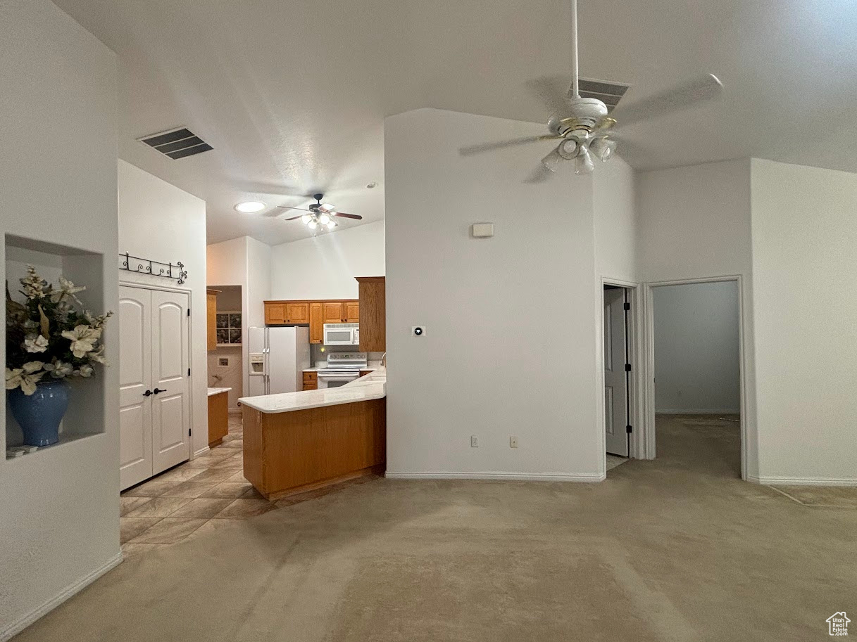 View or the kitchen, 2nd bedroom and bath from the large family room