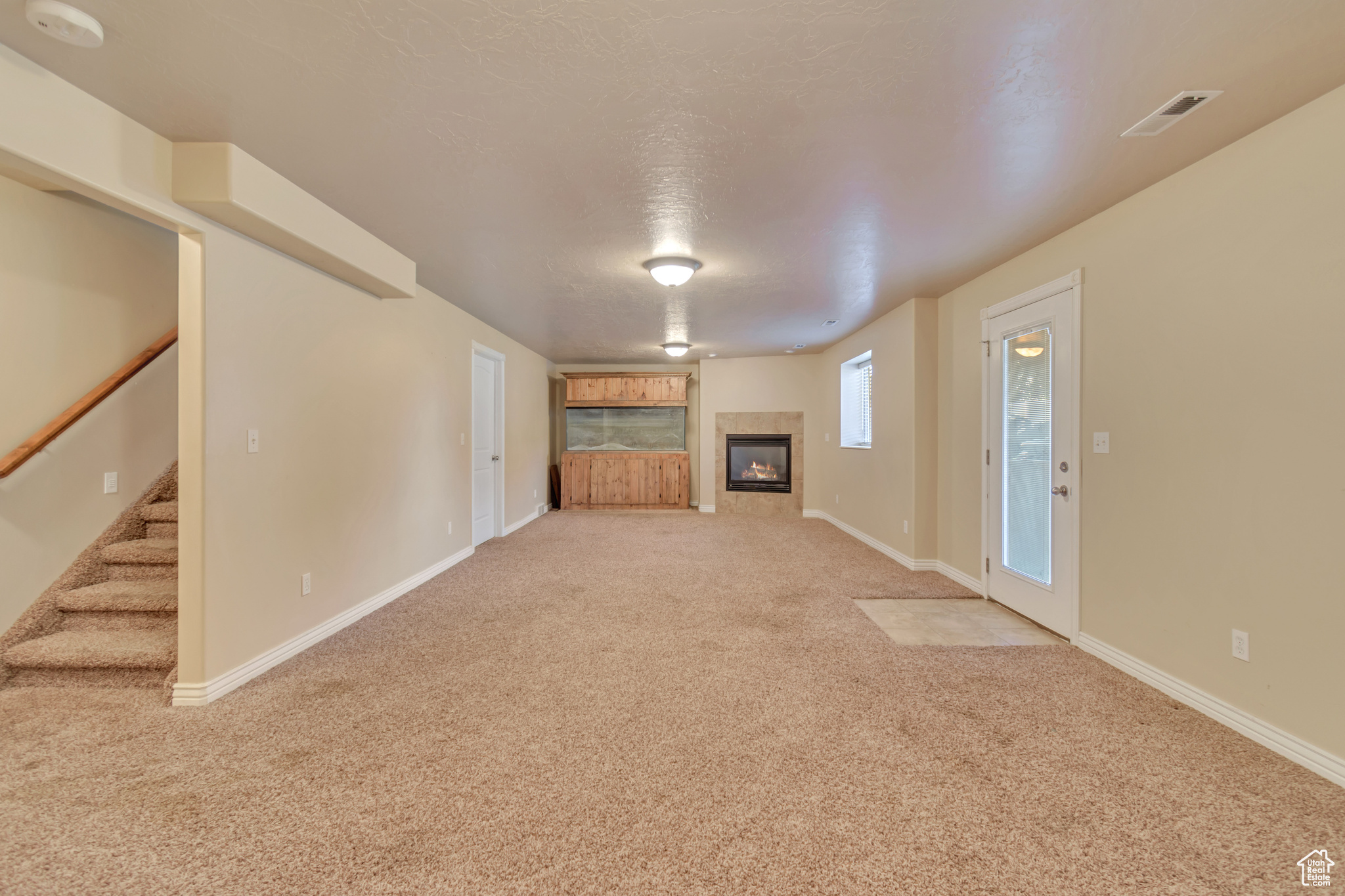 living room with light colored carpet