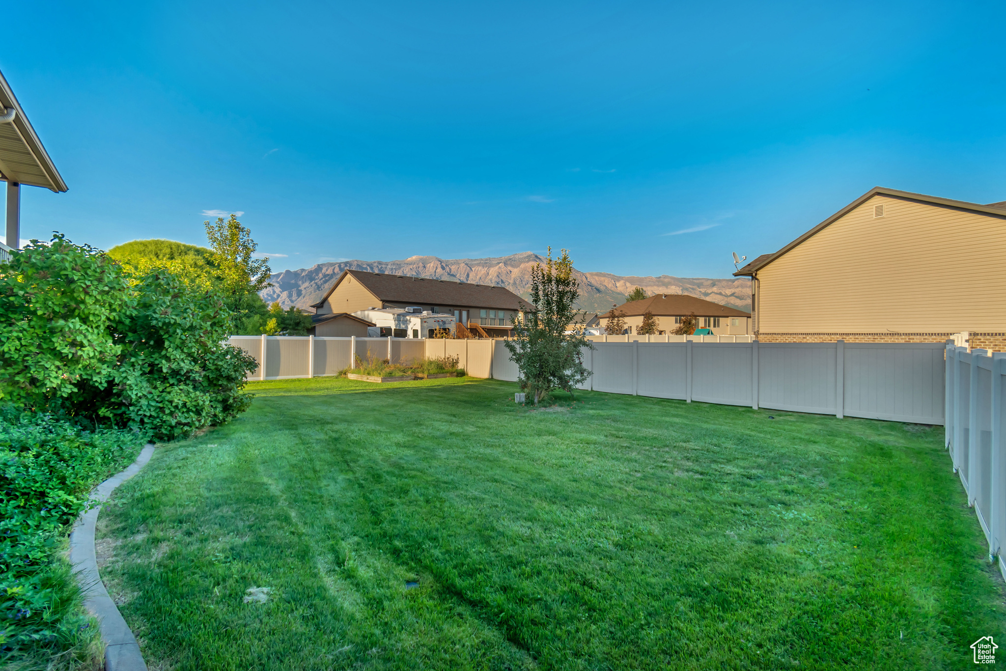 View of yard with a mountain view