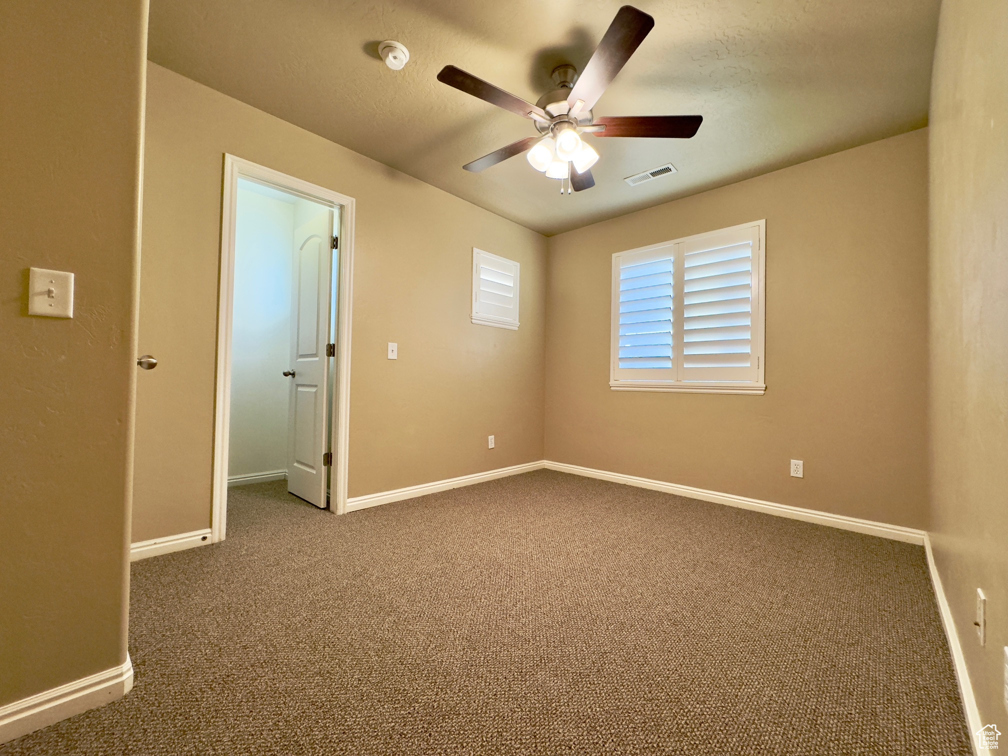 Top floor bedroom with walk-in closet