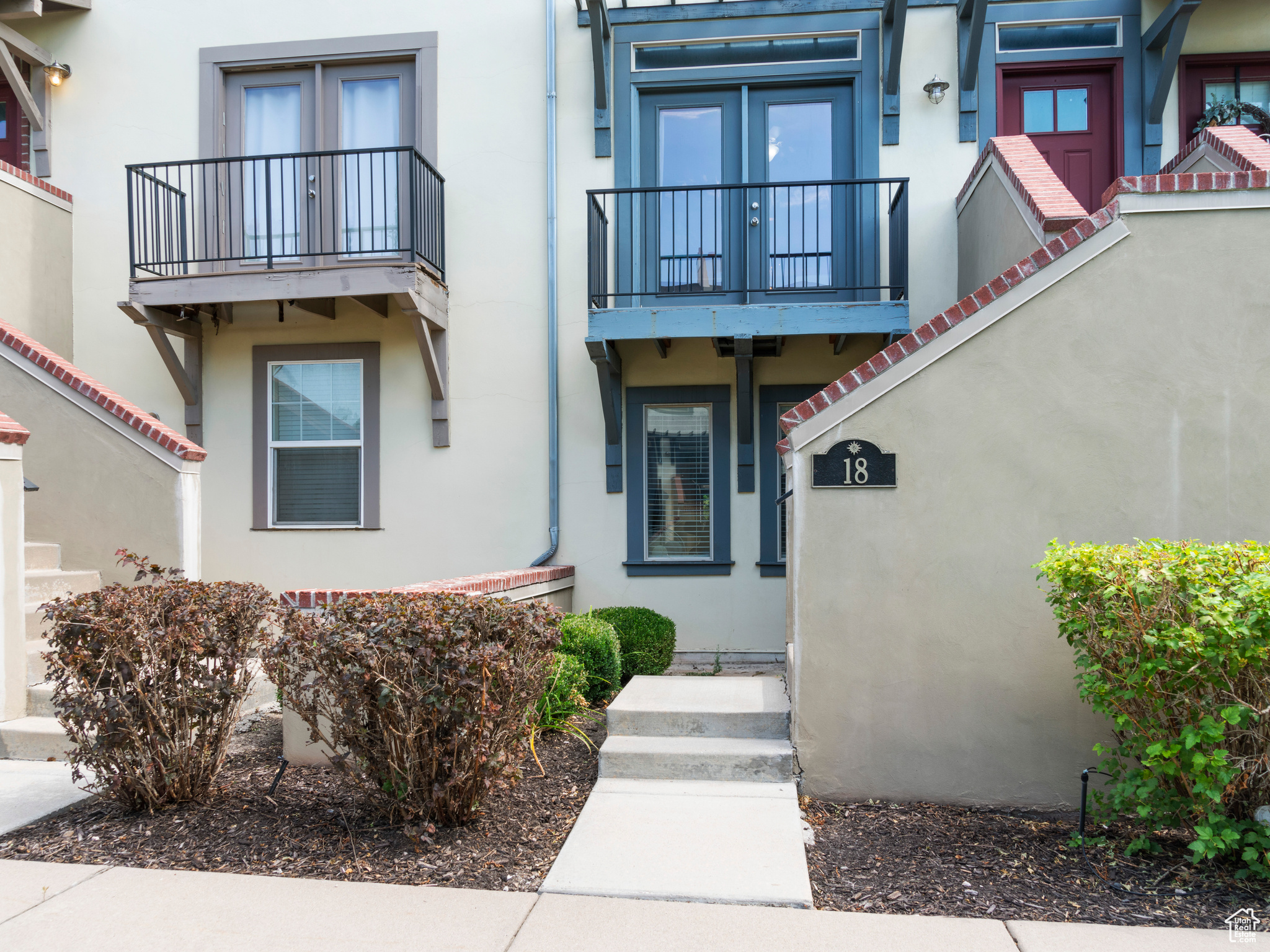 Doorway to property featuring a balcony