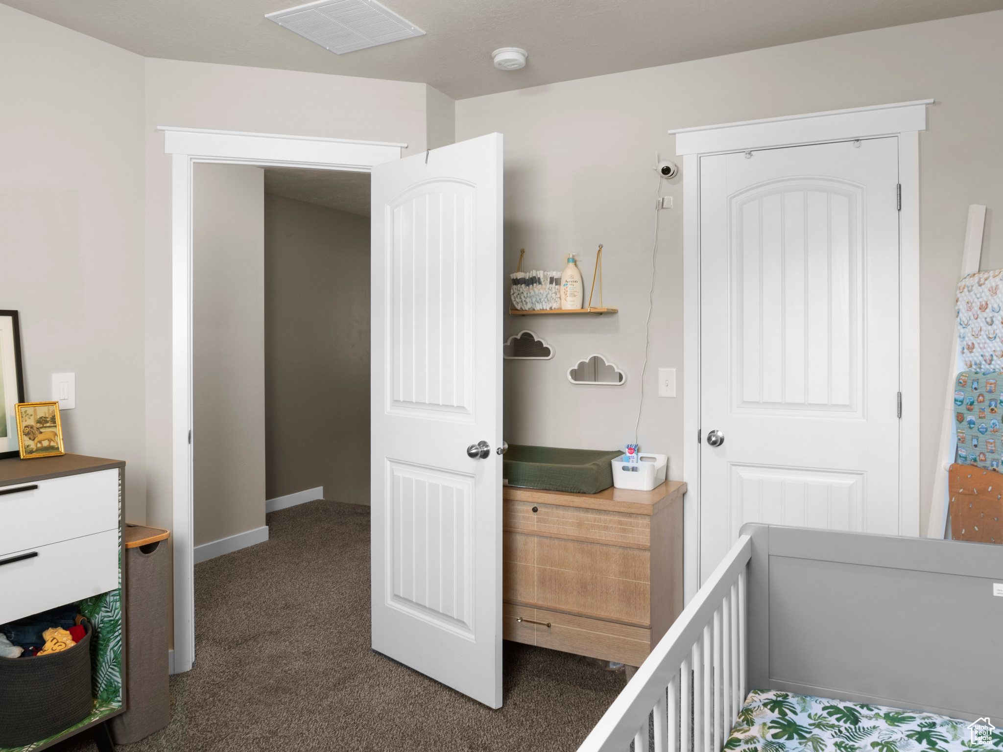 View of carpeted bedroom