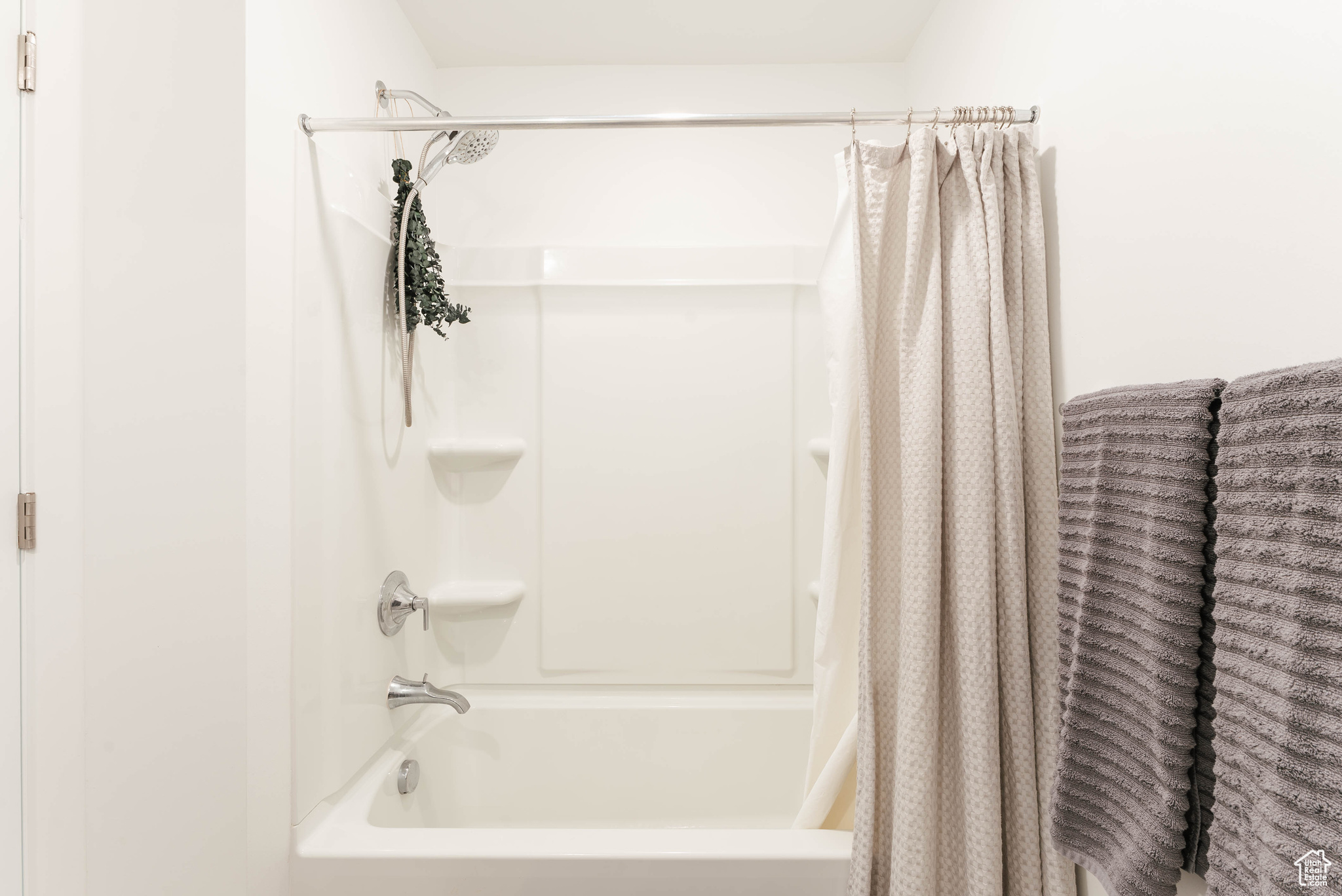 Bathroom with shower / bath combo with shower curtain